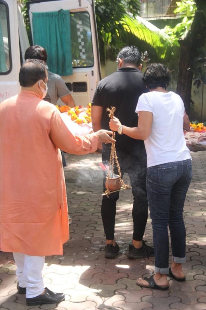 Defying Age Old Tradition Mandira Bedi Carries Husband Raj Kaushals 