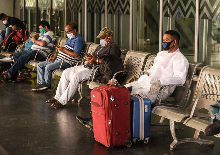 Passengers At Airport with face mask