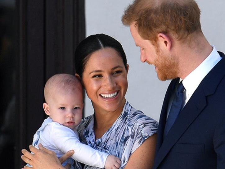 Prince Harry and Meghan Markle with Archie.