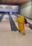 In the video, an elderly woman can be seen bowling in an alley. The grandmother manages to hit a strike, turns around and then ensures that her mask is properly covering her face. 