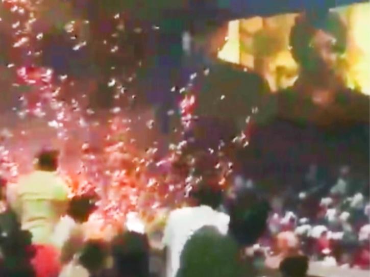 Salman khan fans burst crackers during Antim screening.
