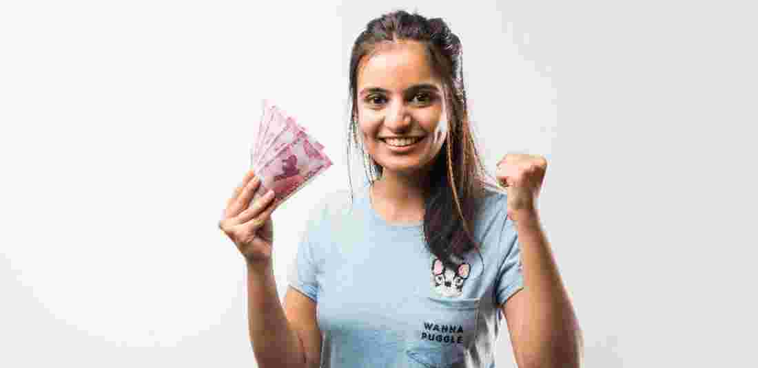 woman happy with money