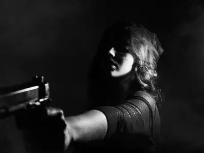 woman killing with a gun