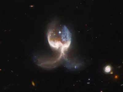 Cosmic Collision Of Two Galaxies Looks Like Symmetrical 'Angel Wings' In Space