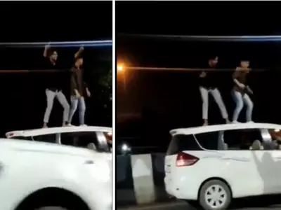 drunk youth ghaziabad dancing on moving car penalised 