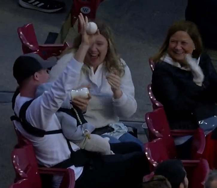 Man Catches Baseball While Feeding Baby