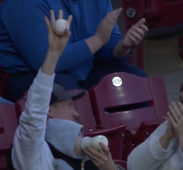 Man Catches Baseball While Feeding Baby