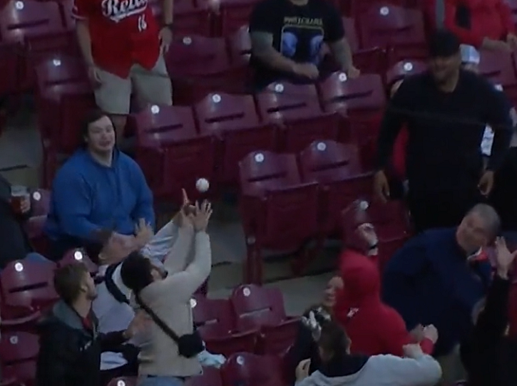 Man Catches Baseball While Feeding Baby