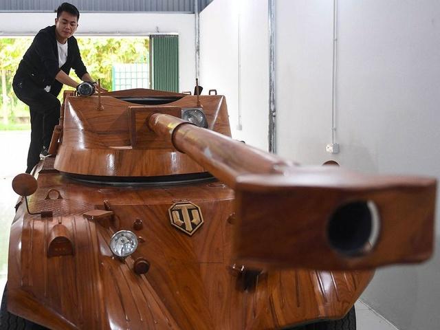 vietnam man converts minibus into wooden tank for son