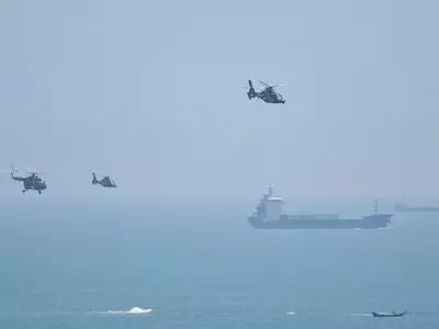 hinese military helicopters fly past Pingtan island