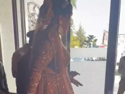 Bride Rides Luggage Trolley To Wedding Video