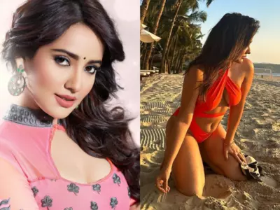Neha Sharma Flaunts In Orange Bikini, Netizens Align The Actress With Besharam Rang Controversy