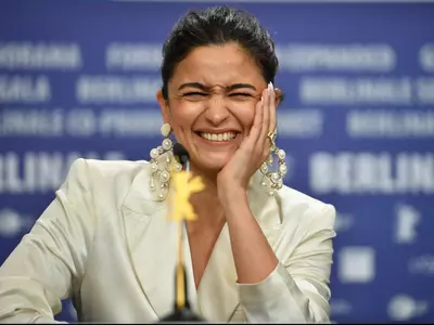 Alia Bhatt blushingly smiles at Berlin International Film Festival.