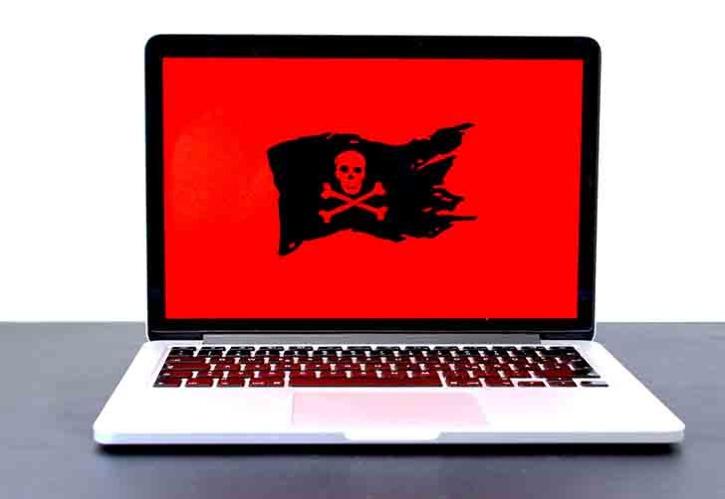 computer laptop with pirate flag