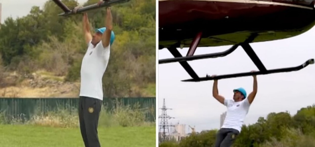 man-does-pull-ups-while-hanging-from-a-helicopter-to-set-guinness-world