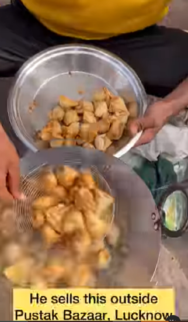 Street Vendor Sells Samosas On Makeshift Stove