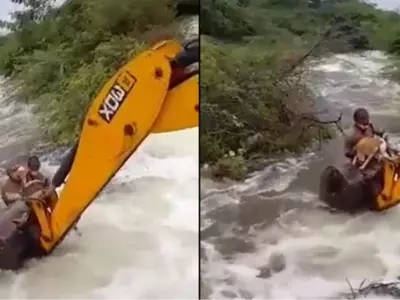 telangana homeguard rescues dog from overflowing river 