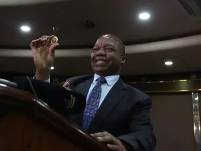 Zimbabwe Governor John Mangudya Introduced Gold Coin