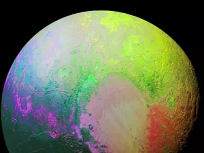 Pluto In Beautiful Shades Of Rainbow Shared By NASA