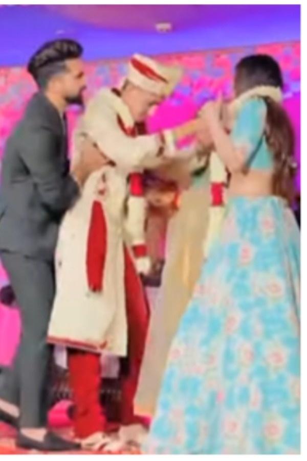 Staged Video Of Groom Putting Varmala Around Sister-In-Law's Neck Staged Video Of Groom Putting Varmala Around Sister-In-Law's Neck