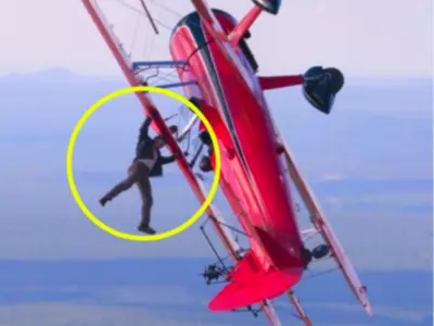 In yet another insane stunt, Tom Cruise hangs off a plane for Mission: Impossible - Dead Reckoning Part One (Mission: Impossible 7)
