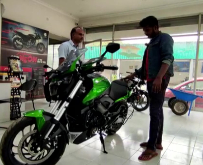 tamil nadu youth buys dream bike with coins he saved in three years