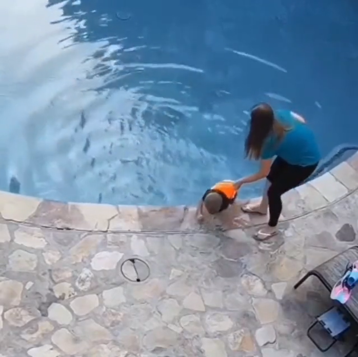 Woman Saves Son from drowning