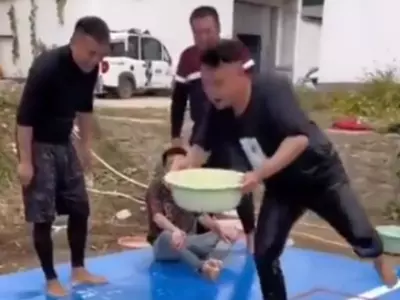 Men Play Stapoo On Soap Water
