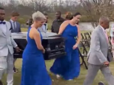 groom arrives in a coffin 