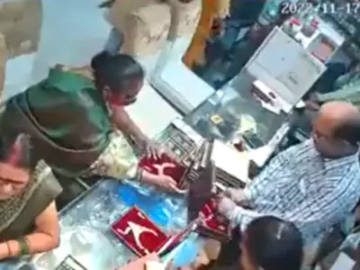 Woman Steals Gold Necklace