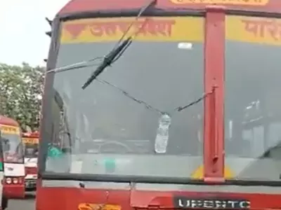 driver uses water bottle