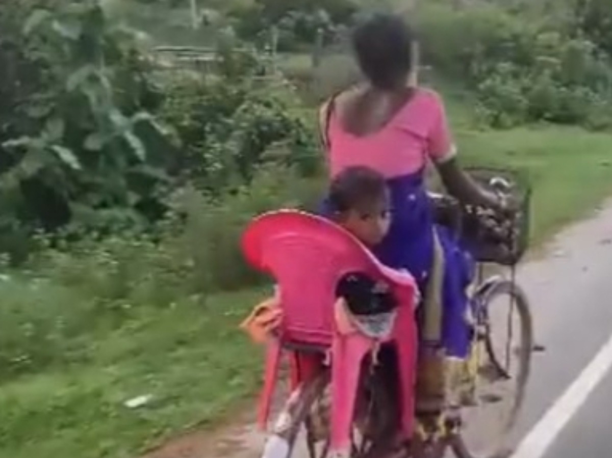 Mother Makes Ingenious Backseat For Her Child On Bicycle