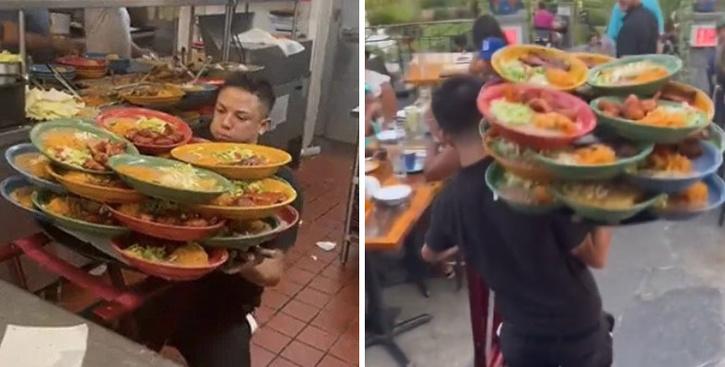 A waiter has gone viral after he was seen carrying dozens of plates to serve multiple customers at once.