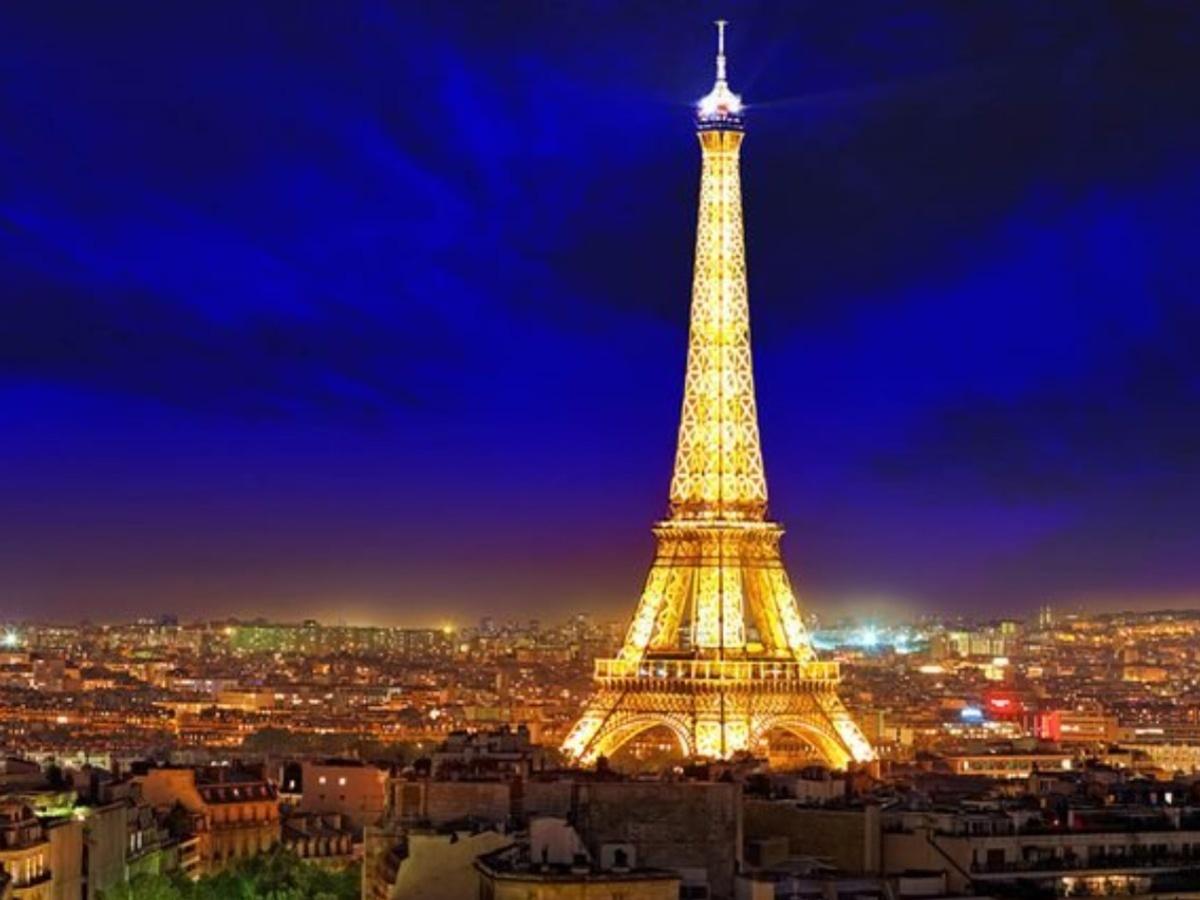 Lights out early for Eiffel Tower as Paris saves energy