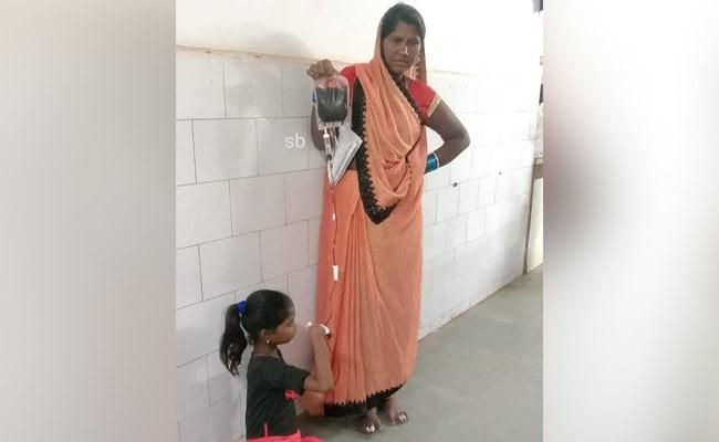 blood offered to the girl by making her sit on the floor,