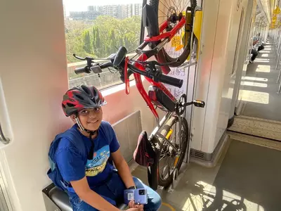 Boy Travels With Bicycle On Mumbai Metro