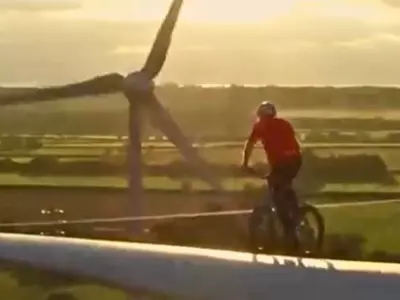 Pro Cyclist Rides Wind Turbine Blade