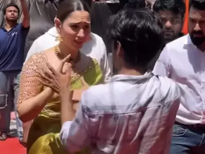 tamannaah bhatia's fan jumps over barricade to meet her