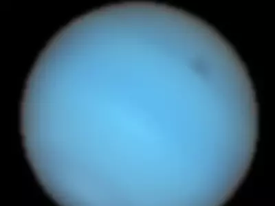 Astronomers Capture Spectacular View Of Neptune's Mysterious Dark Spot
