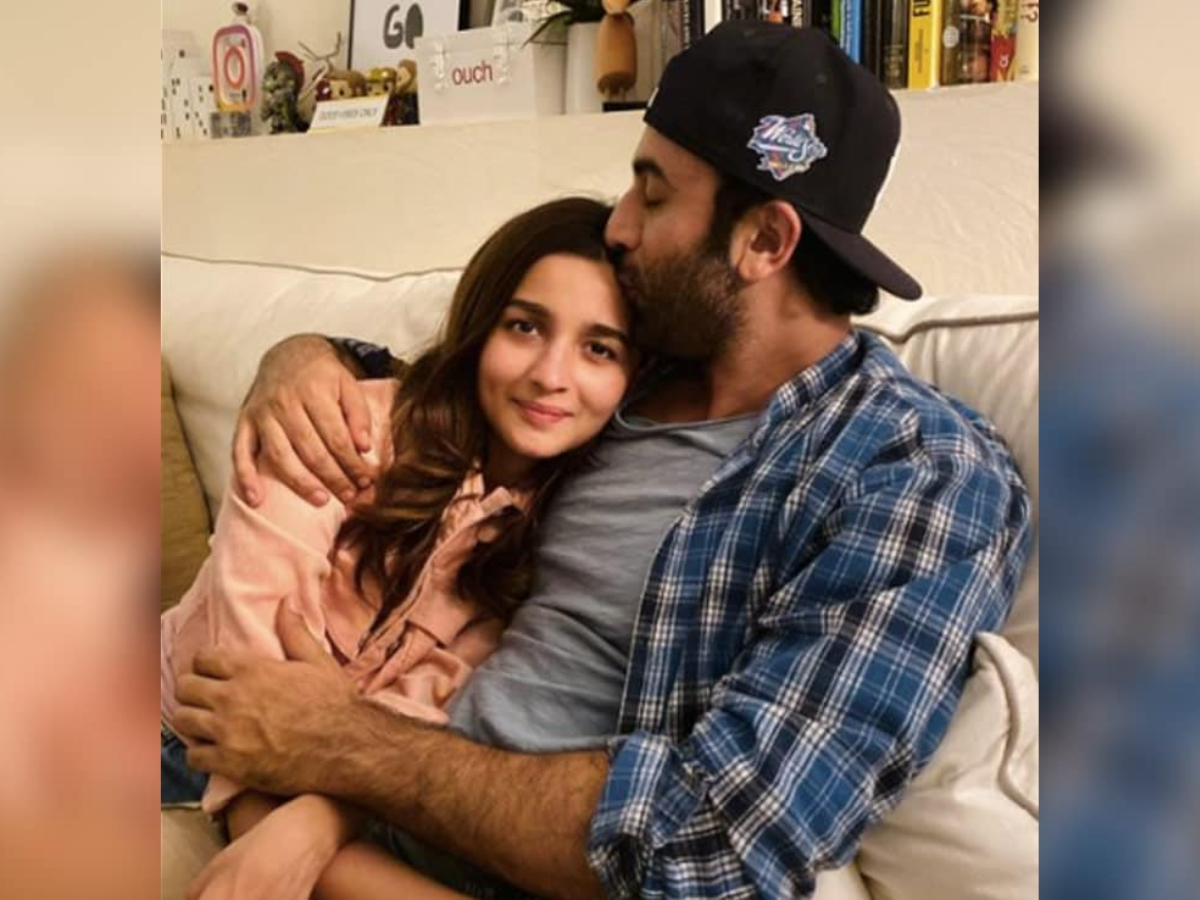 Alia Bhatt tries to fix Ranbir Kapoor's hair, he pushes her hand away.  Watch