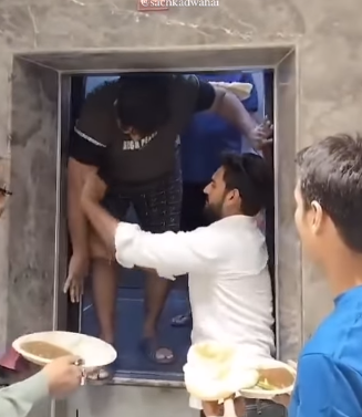 Online video shows family trapped in elevator with Chole Bhature dishes