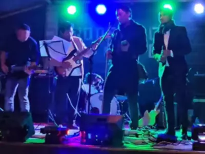 In A Performance On Stage, Meghalaya Cm Conrad Sangma Plays A Guitar Solo From The Music Video Of Iron Maiden