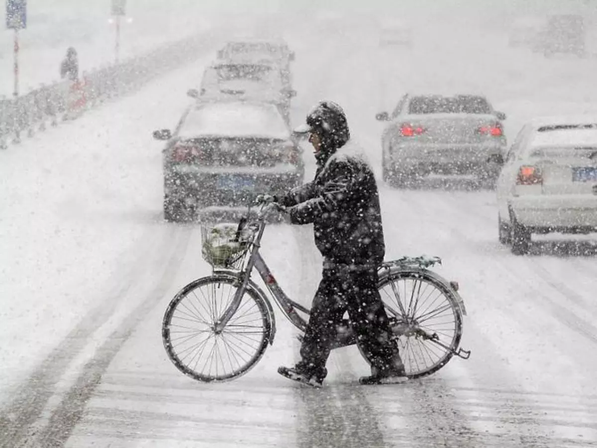 Rare, Extreme Snowfall In Eastern China Buries Parked Cars Under Two