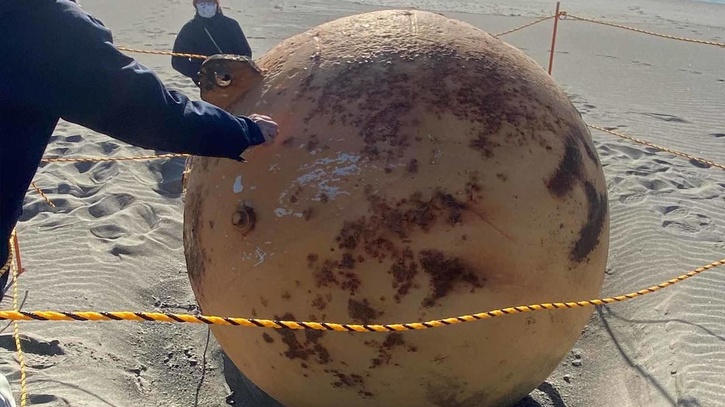 Mysterious iron ball found on the beach in Japan