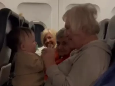 women help new mom calm crying baby