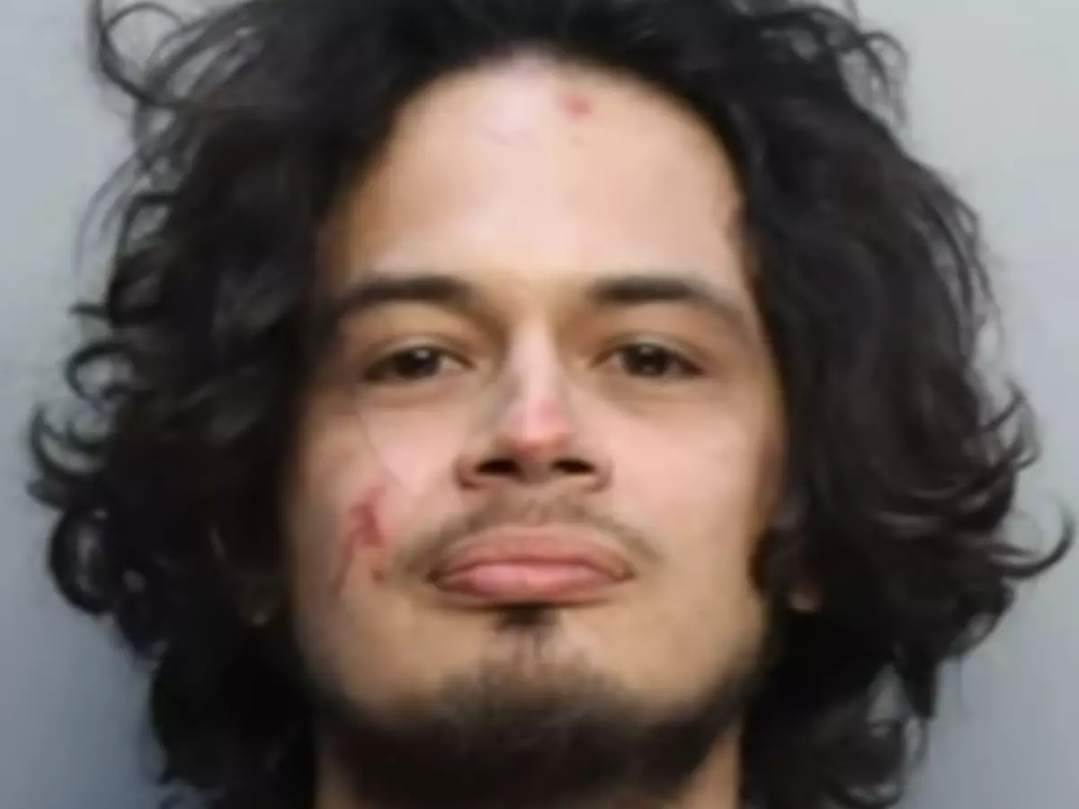 Enraged Man Bites Off Python's Head