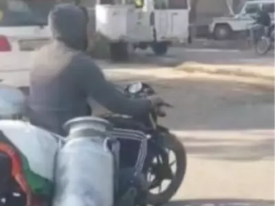 Man Delivers Milk On Harley Davidson Bike