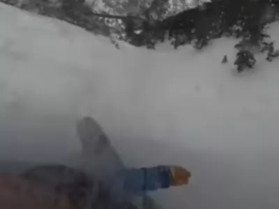 Man Snowboards Through An Avalanche In Viral Video