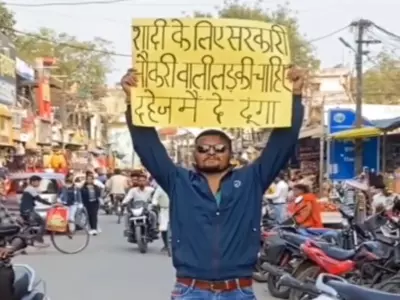 Man Holds Up Matrimonial Poster In Crowded Market
