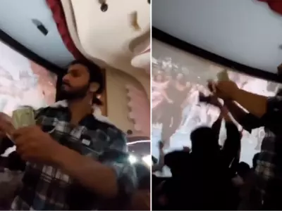 Man Throws Bundles Of Notes In The Air At Screening Of SRK-Deepika Padukone's Film Pathaan